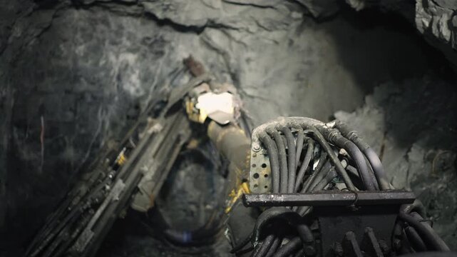 Preparation for drilling. Drilling rig boom. View from the drilling machine cabin.