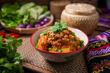 Spicy Northern Thai Pork with Tomato,Northern thai chilli dip,thai called Nam prik ong , lanna cuisine, northern thai food