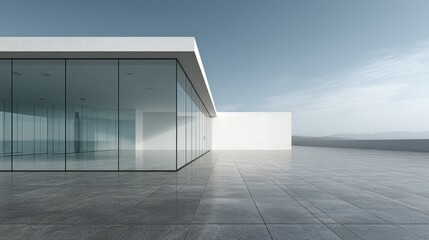 Obraz premium Modern architectural design of a glass building with a minimalist exterior on a clear day