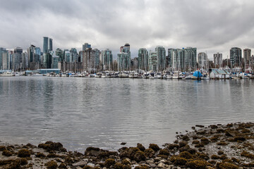 Fototapeta premium High-rise buildings with modern glass facades in the city of Vancouver, BC Canada. 