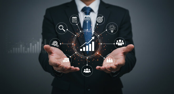 Businessman holding virtual dashboard showcasing growth strategy and business analytics for success
