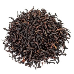 Obraz premium Dark tea leaves piled high, rich brown color, fine strands