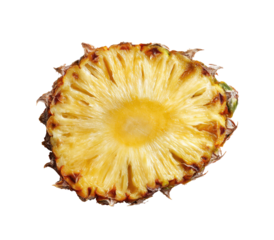 Close-up cross-section of a pineapple.  A slice reveals a bright yellow interior with radiating segments and a light-gold center.  The outer rind is a darker golden-brown
