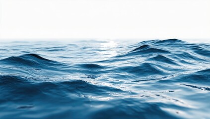 A close-up view of rippling ocean waves.  Deep blues and grays create a sense of vastness