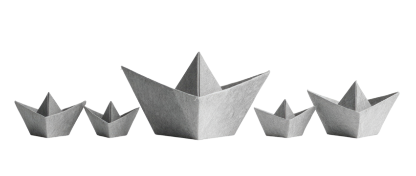 Several gray paper boats in various sizes, arranged in a horizontal row
