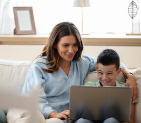 Mom showing funny videos to cheerful son