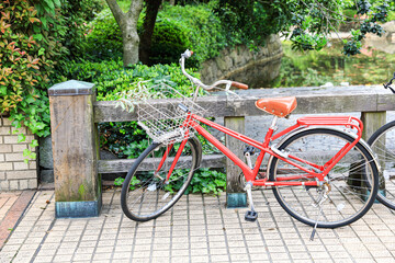 Fototapeta premium bicycles, The popular transportation type in japan parked on the sidewalk. 