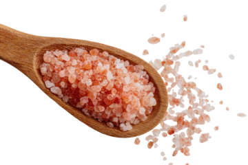 Pink Himalayan salt in a wooden spoon