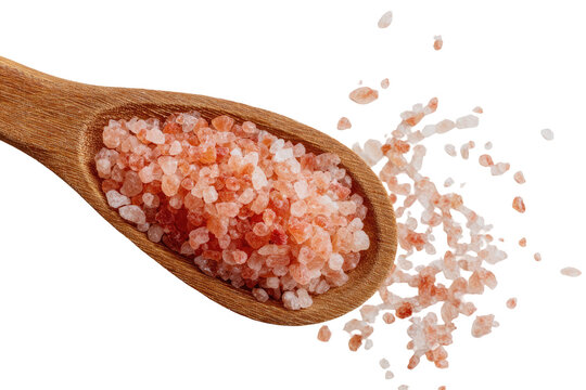 Pink Himalayan salt in a wooden spoon