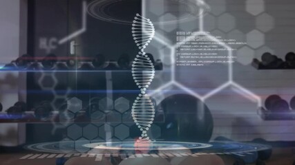 male instructor placing medicine ball then raising and activating DNA helix for fitness tech - Powered by Adobe