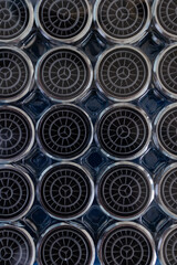 Circular patterns create a striking visual rhythm in modern design elements across a flat surface