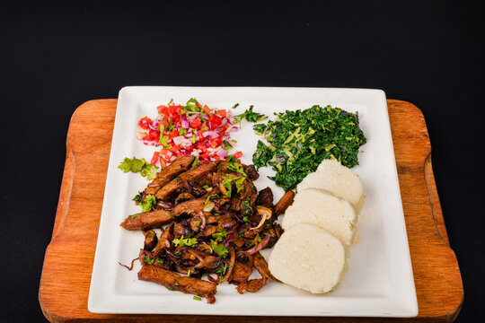 Ugali Nyama Choma Kachumbari Pilipili Sukuma wiki 