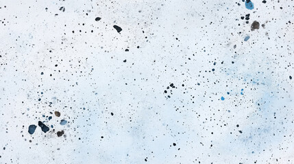 Obraz premium Artistic paint splatter texture on a light background with dynamic black, grey, and blue ink droplets