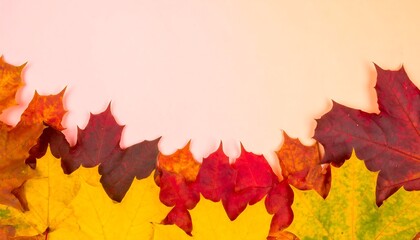 Autumnal maple leaves in vibrant hues of red, orange, and yellow form a decorative border against a soft pastel background.