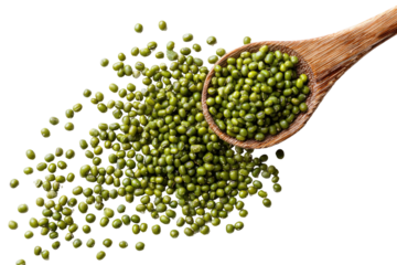 Wooden spoon brimming with vibrant green mung beans, spilling out in a scattered pattern