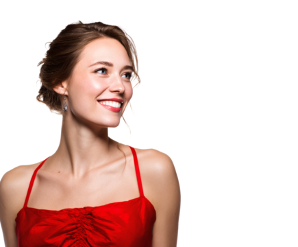 A woman smiles radiantly in a red dress, exuding joy and elegance.
