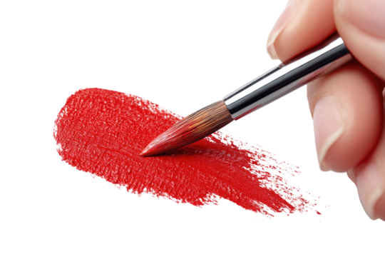 A hand holds a paintbrush, applying red paint to a textured surface.  The brush strokes create a shape resembling a smear or a heart