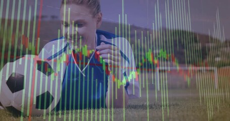soccer player shifting gaze and brushing hair on field, overlaying translucent charts for finance - Powered by Adobe