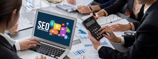 Business intelligence and data analysis concept. Analyst team working on financial data analysis...