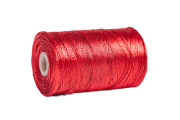 Sewing thread action studio textile close-up bright red color