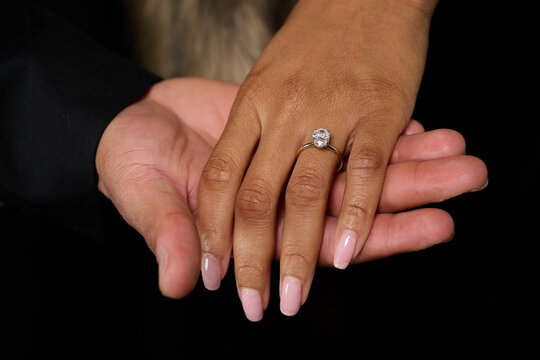 HOUSTON, TEXAS - JANUARY 6th 2024: Engagement portraits in The Woodlands studio with a black backdrop, professional lighting, and timeless style&mdash;capturing a real-time proposal and heirloom memories.