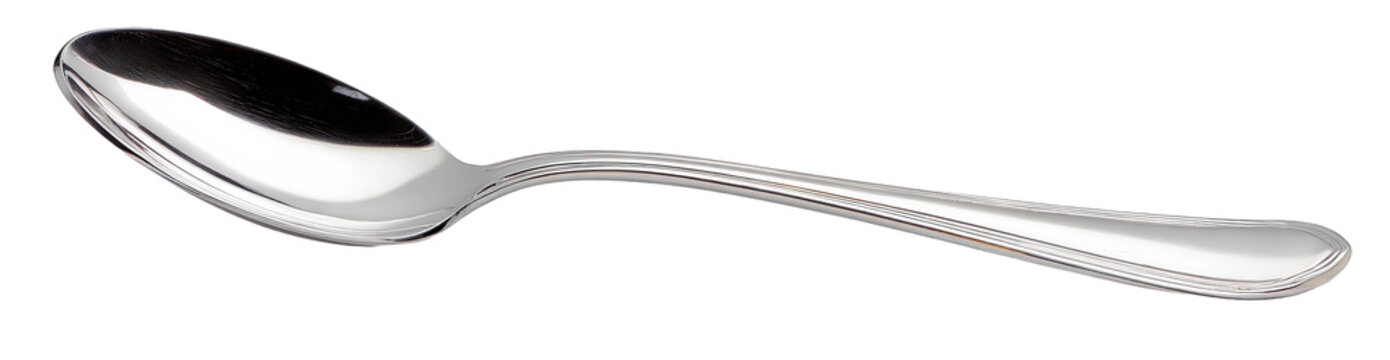 A polished, metallic teaspoon lies horizontally
