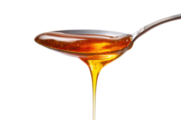 Pouring honey on a spoon kitchen food photography close-up