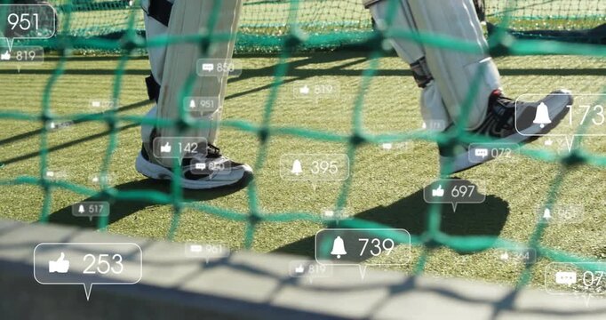 With alert appearing on turf inside net, cricketer shifting stepping while social icons climbing