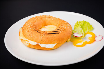 bagel with cream cheese and chives