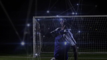 Incoming ball causing digital nodes overlay while soccer player executing bicycle kick netting goal - Powered by Adobe