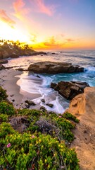 Coastal sunset over rocky beach