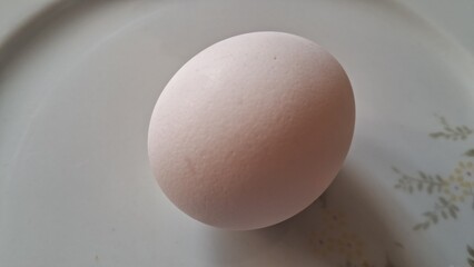 Egg on a white plate