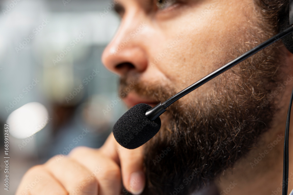 Poster close up of stockbroker talking with clients using audio headset mic, executing buy and sell orders.