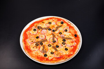 pizza on a black background