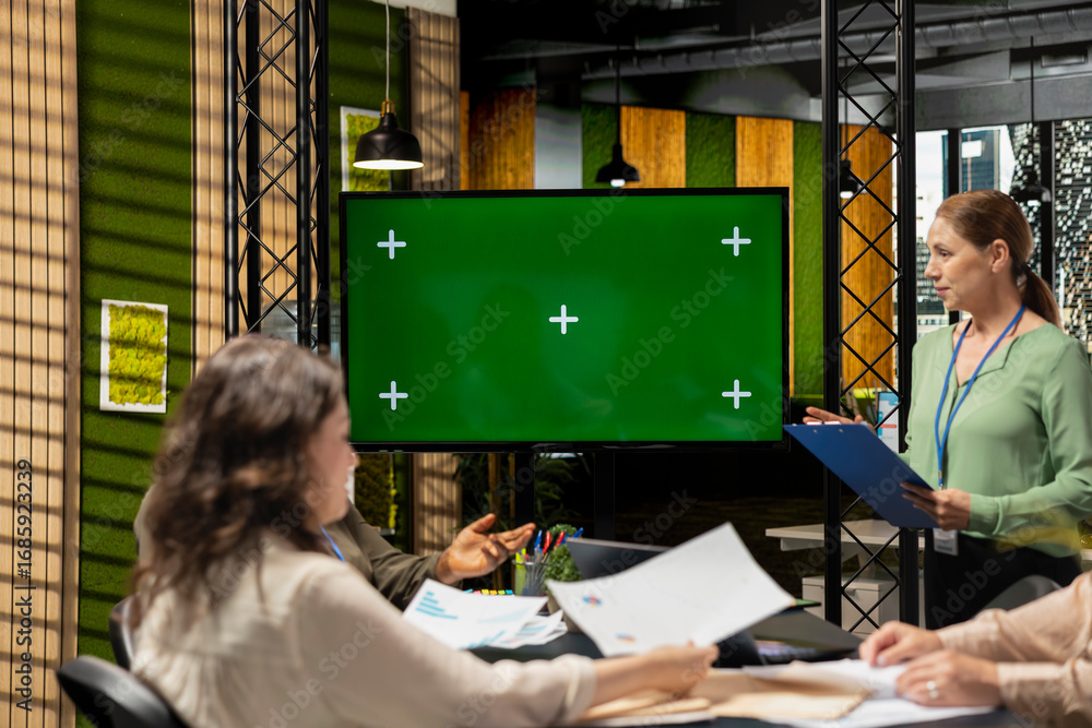 Aufkleber diverse investors group using copy space on tv monitor screen for performance indicators, setting co