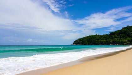 Naklejka premium A tranquil beach scene showcases soft turquoise water lapping at a golden shore, framed by lush green hills and a vibrant sky filled with fluffy clouds.