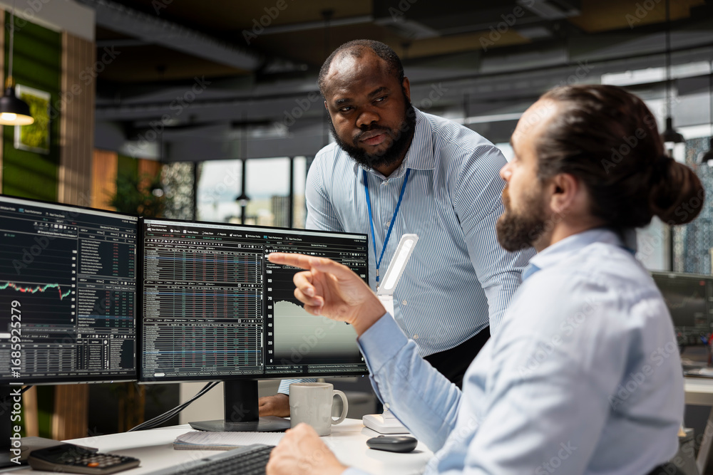 Poster manager supervising day trader using trading app to capitalize on market fluctuations when buying an
