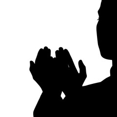 Silhouetted Person Offering Prayers With Hands Clasped Together in Supplication