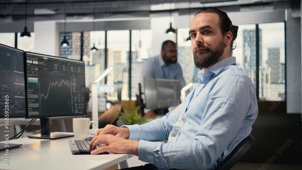 Poster close up of happy trader in prop firm workplace analyzing market data and executing trades using tra