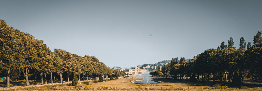 Panoramic view of Ch&acirc;teau Bor&eacute;ly and fountains, Parc Bor&eacute;ly, Borely Park, Marseille, Marseilles, France. Fine art landscape, historic garden and blue sky