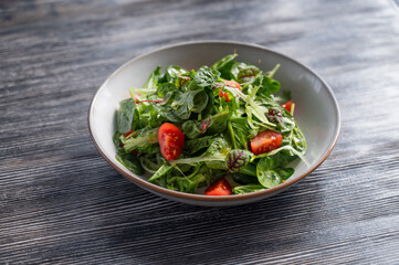 Green salad served in a cafe. 
