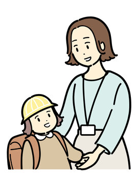 小学生と付き添い登校をする女性