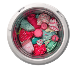 Top-down view of a washing machine drum filled with colorful children's clothes
