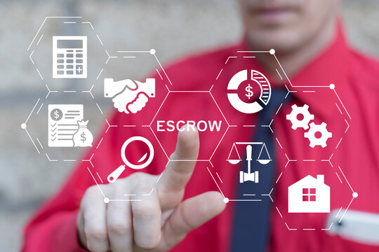 Business person using virtual touch screen presses the words ESCROW. Concept of In Escrow Agreement. Escrow Account Business Deal.