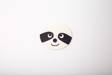 sloth face made from paper cutouts. playful and minimalist perfect for a kids art project. Recycled...