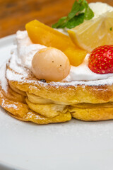 Delicious dessert with fresh fruit and whipped cream, perfect for restaurant menus and food blogs