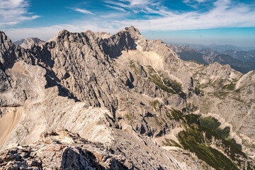 Scenic View Of Zugspitze And Jubilee Ridge From Via Ferrata Alpspitze: Rugged Rocky Peaks Of The Bavarian Alps Under Clear Blue Sky