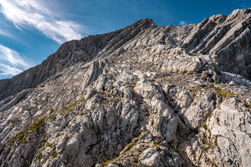 Rocky Section Of The Via Ferrata Alpspitze In The Bavarian Alps: Dramatic Cliffs And Mountain Peaks...