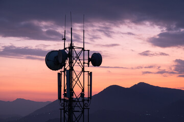 Cell phone tower at sunset
