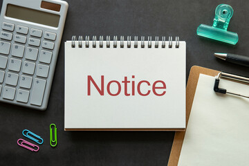 There is notebook with the word Notice. It is as an eye-catching image.